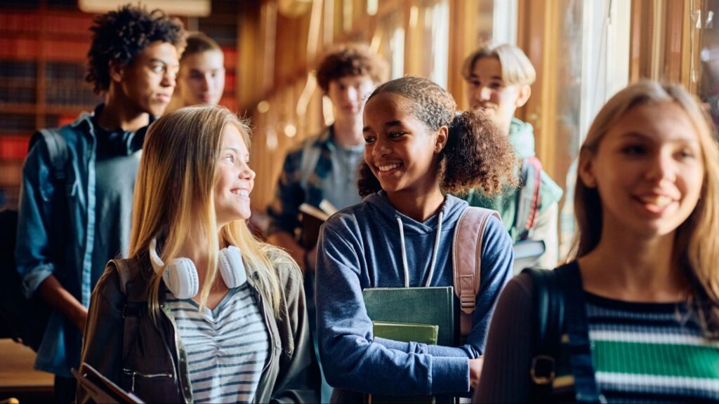 High school students walking on campus as families prepare for private school admissions in Miami.
