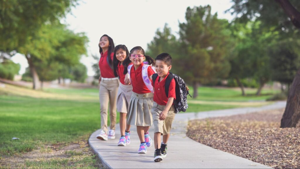 Students walking to private school in Miami after families complete the enrollment process