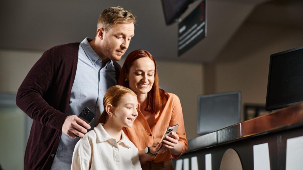 Parents reviewing private school admissions decisions in Miami with their child during the enrollment process